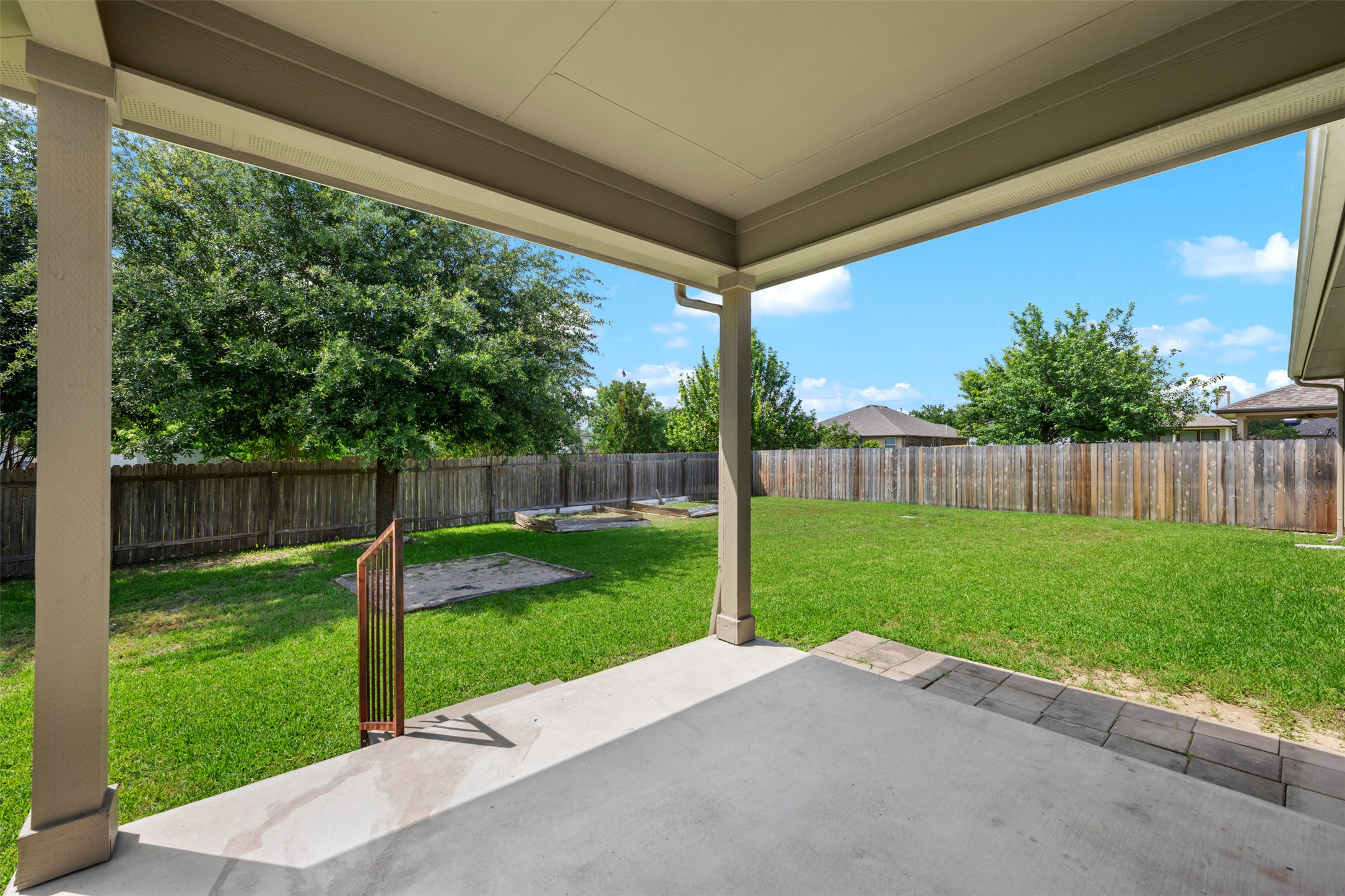 18820 Edinburgh Castle Road Pflugerville, TX 78660 - Photo 37 of 37 a backyard of a house with lots of green space