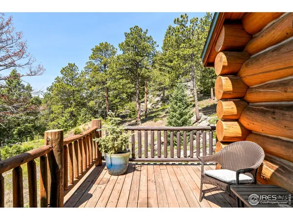 a view of balcony with wooden floor