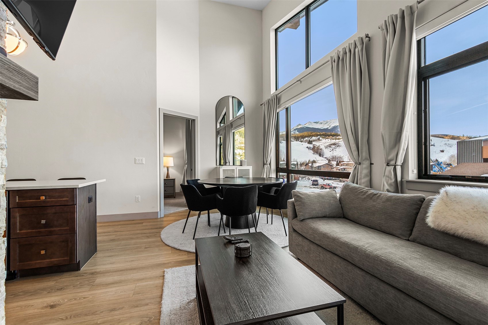 75 West 4th Street, Unit 305W Silverthorne, CO 80498 - Photo 11 of 30 a living room with furniture and a large window