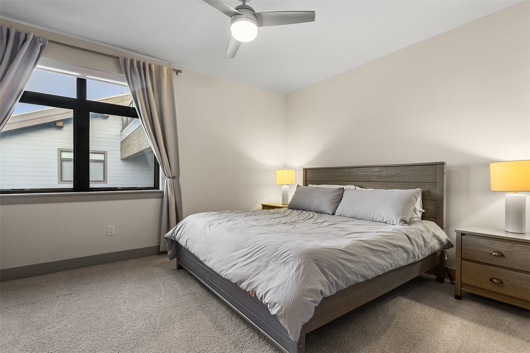 75 West 4th Street, Unit 305W Silverthorne, CO 80498 - Photo 13 of 30 a bedroom with a bed and a window
