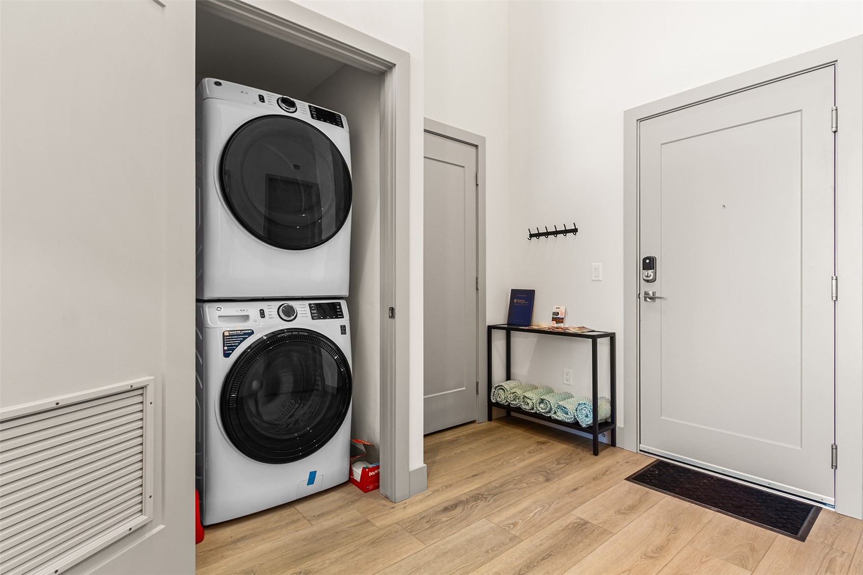 75 West 4th Street, Unit 305W Silverthorne, CO 80498 - Photo 18 of 30 a view of a hallway with washer and dryer