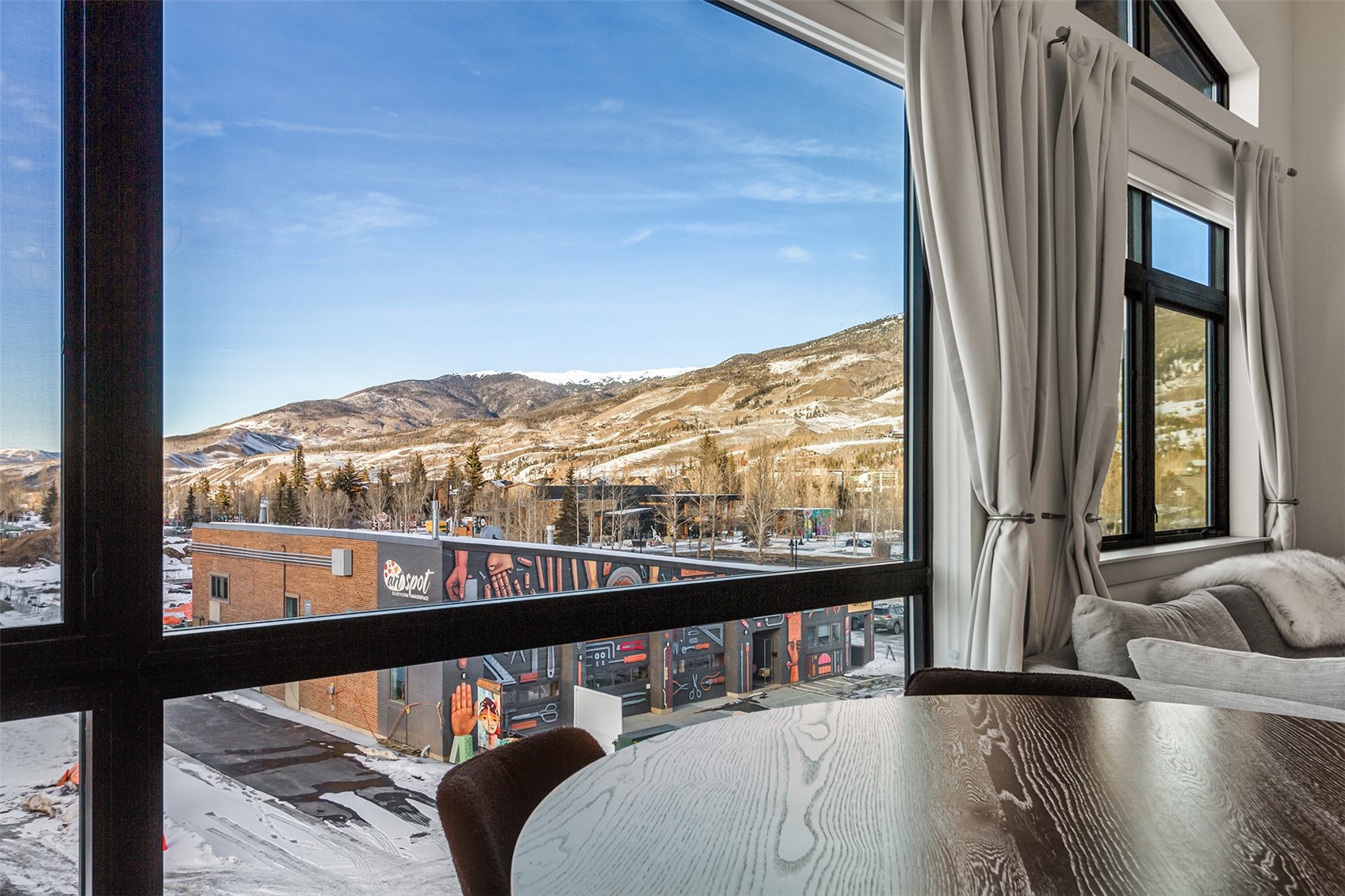 75 West 4th Street, Unit 305W Silverthorne, CO 80498 - Photo 9 of 30 a view of an chairs and table in the balcony