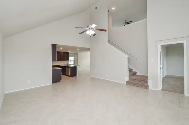 a view of a kitchen with a sink and dishwasher and kitchen view