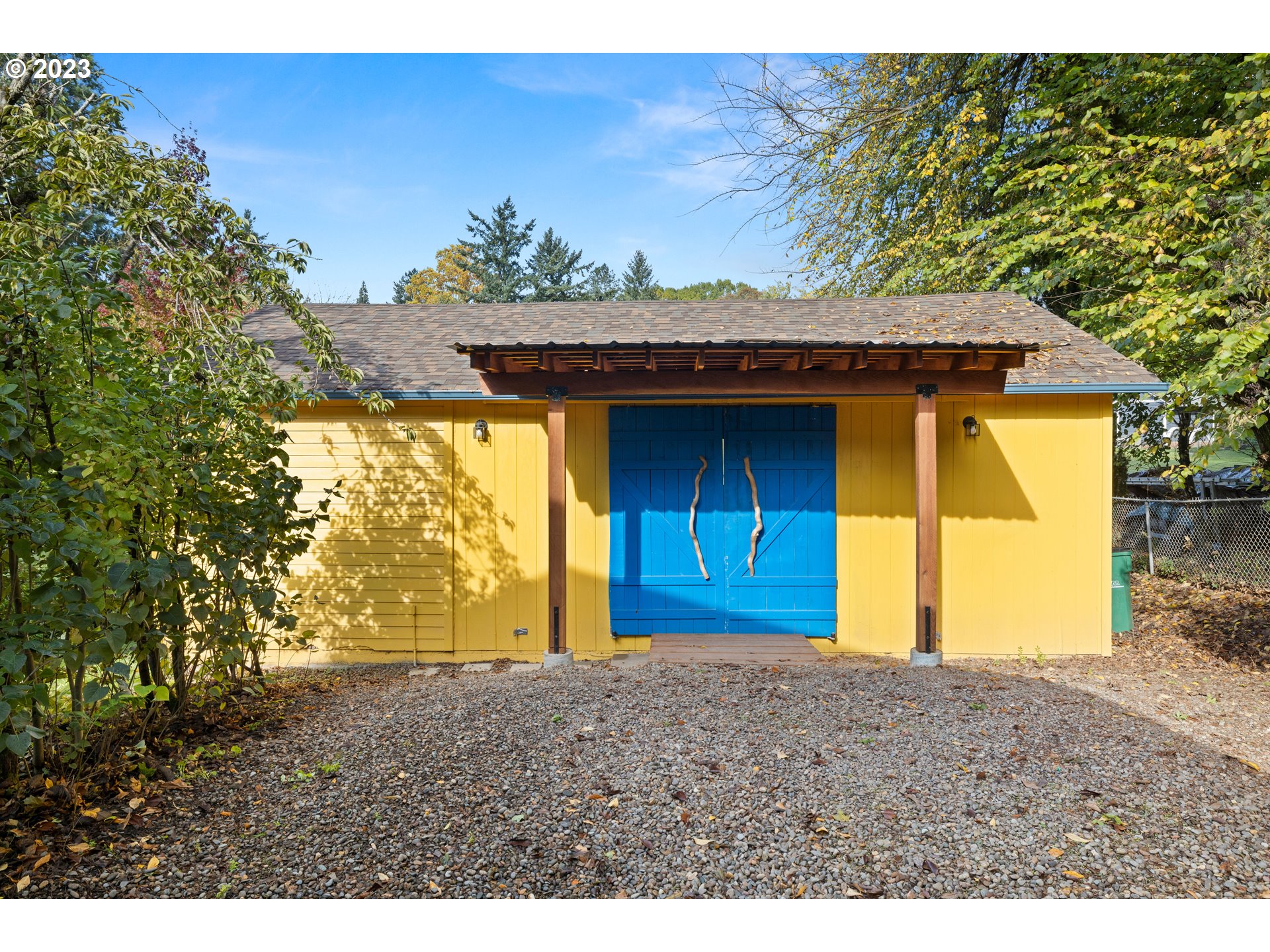 8425 Southwest Ridgeway Drive Portland, OR 97225 - Photo 34 of 41 a view of a house with a backyard