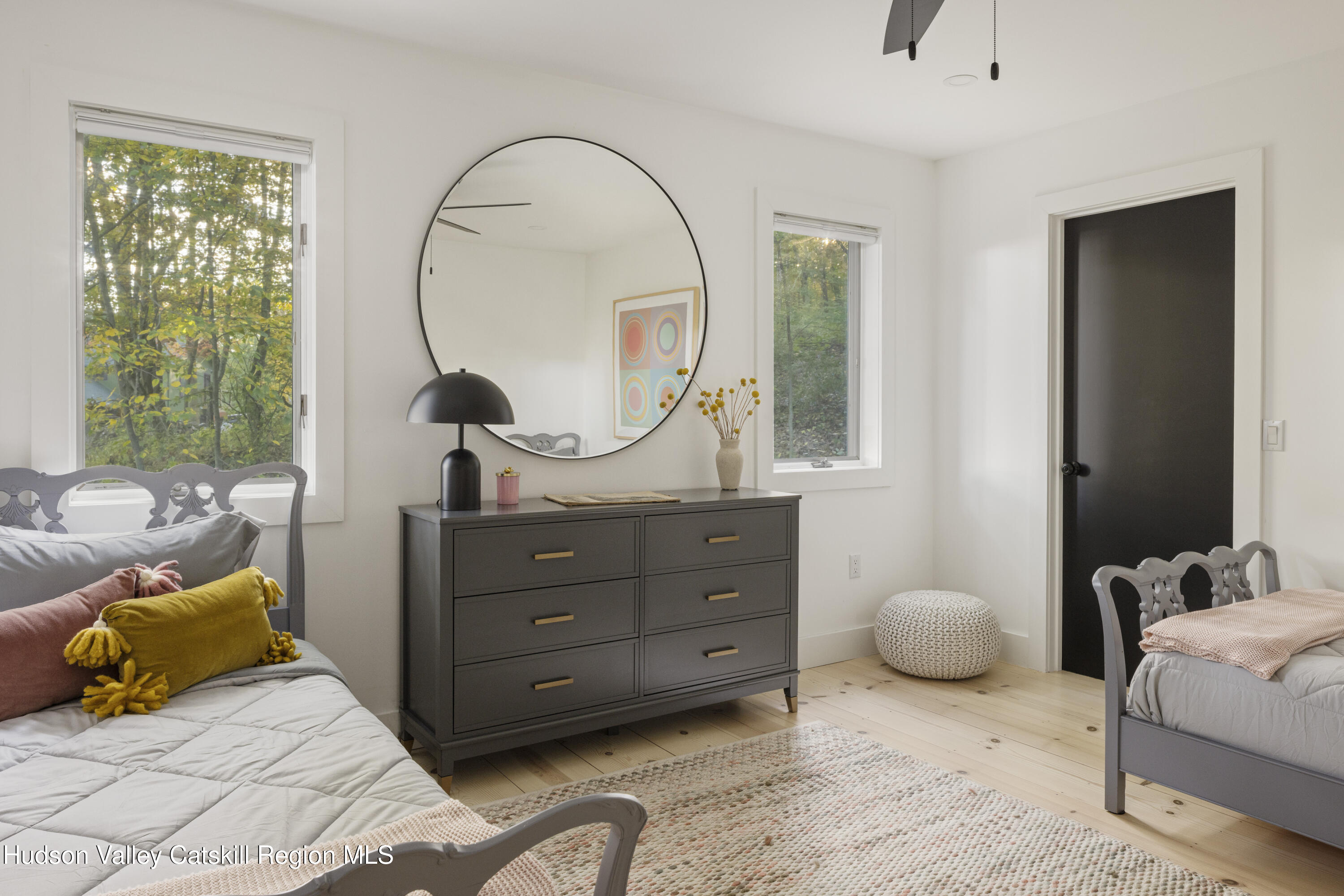 181 Lockwood Road Craryville, NY 12521 - Photo 12 of 19 a bedroom with a bed and a dresser