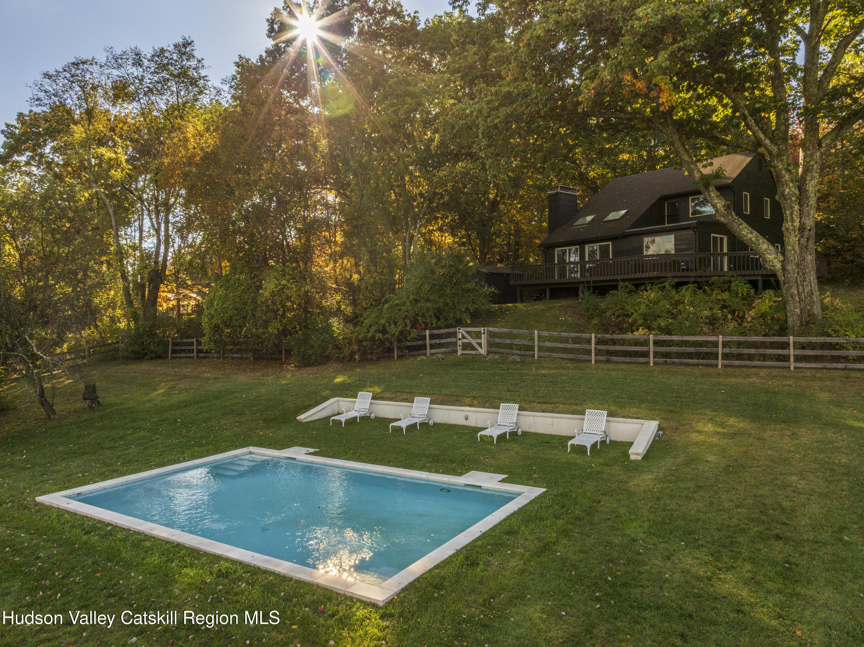 181 Lockwood Road Craryville, NY 12521 - Photo 3 of 19 a view of a golf course with a lake