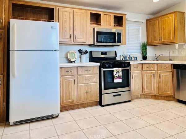 a view of storage and utility room with washer and dryer