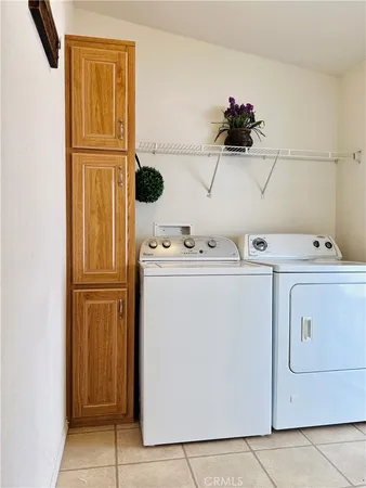 a bathroom with a toilet a sink and a shower