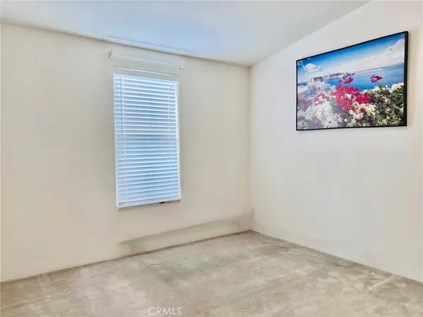a view of a door and a window