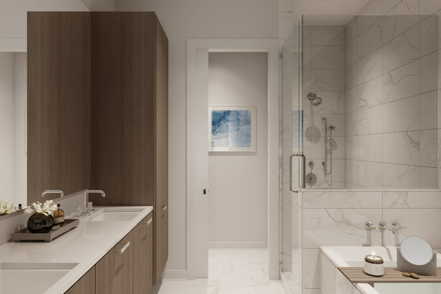 6 North Carpenter Street, Unit 2D Chicago, IL 60607 - Photo 8 of 9 a bathroom with a sink and a mirror