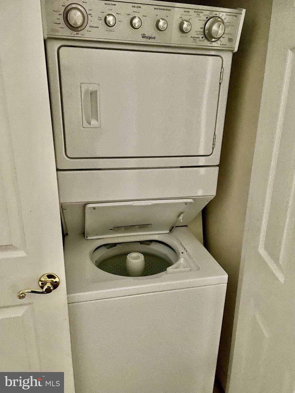 102 Kendrick Place, Unit 10222 Gaithersburg, MD 20878 - Photo 12 of 17 a close up view of washer and dryer