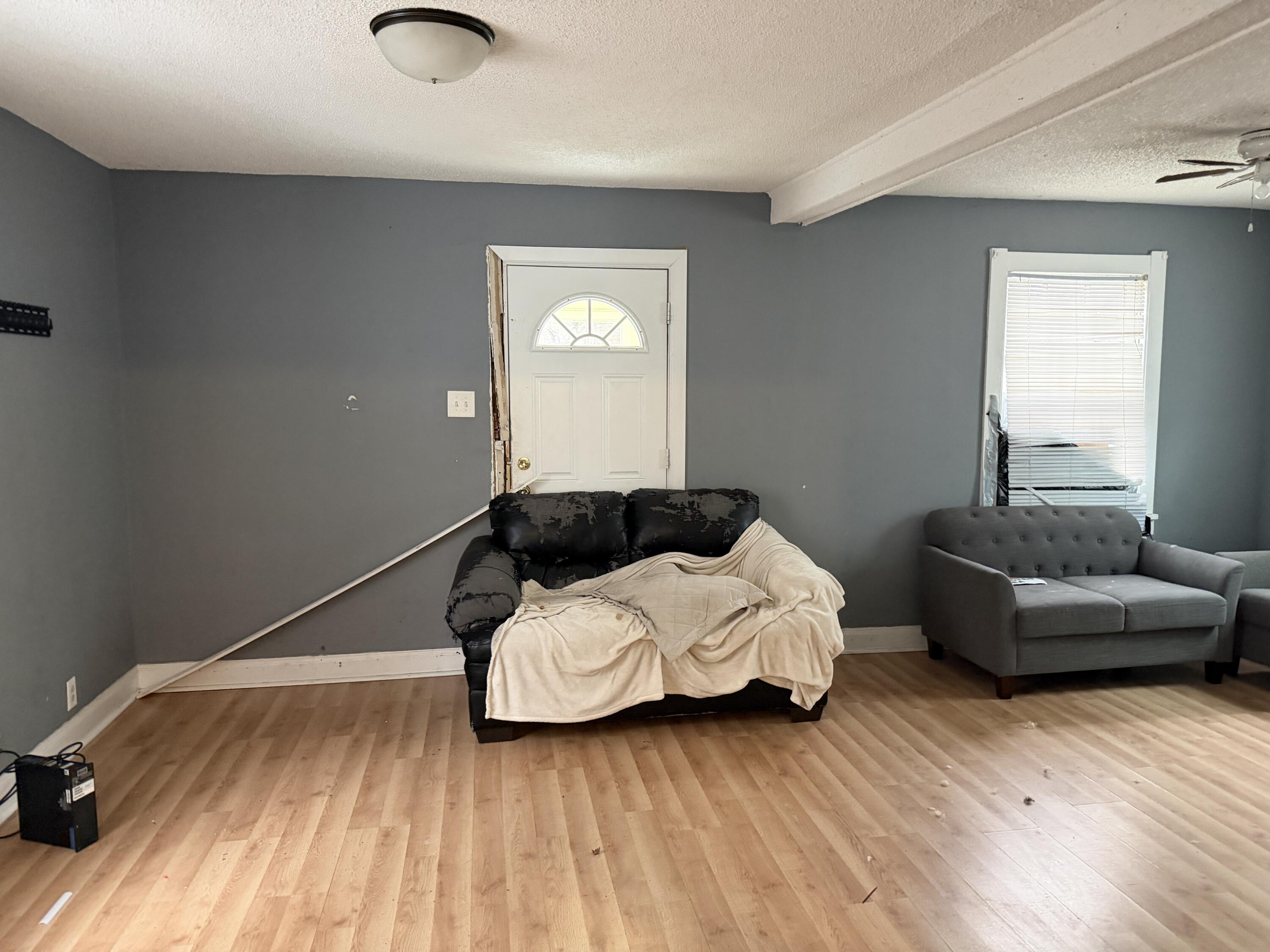 6019 Wallace Road Hammond, IN 46320 - Photo 4 of 10 a bedroom with furniture and wooden floor