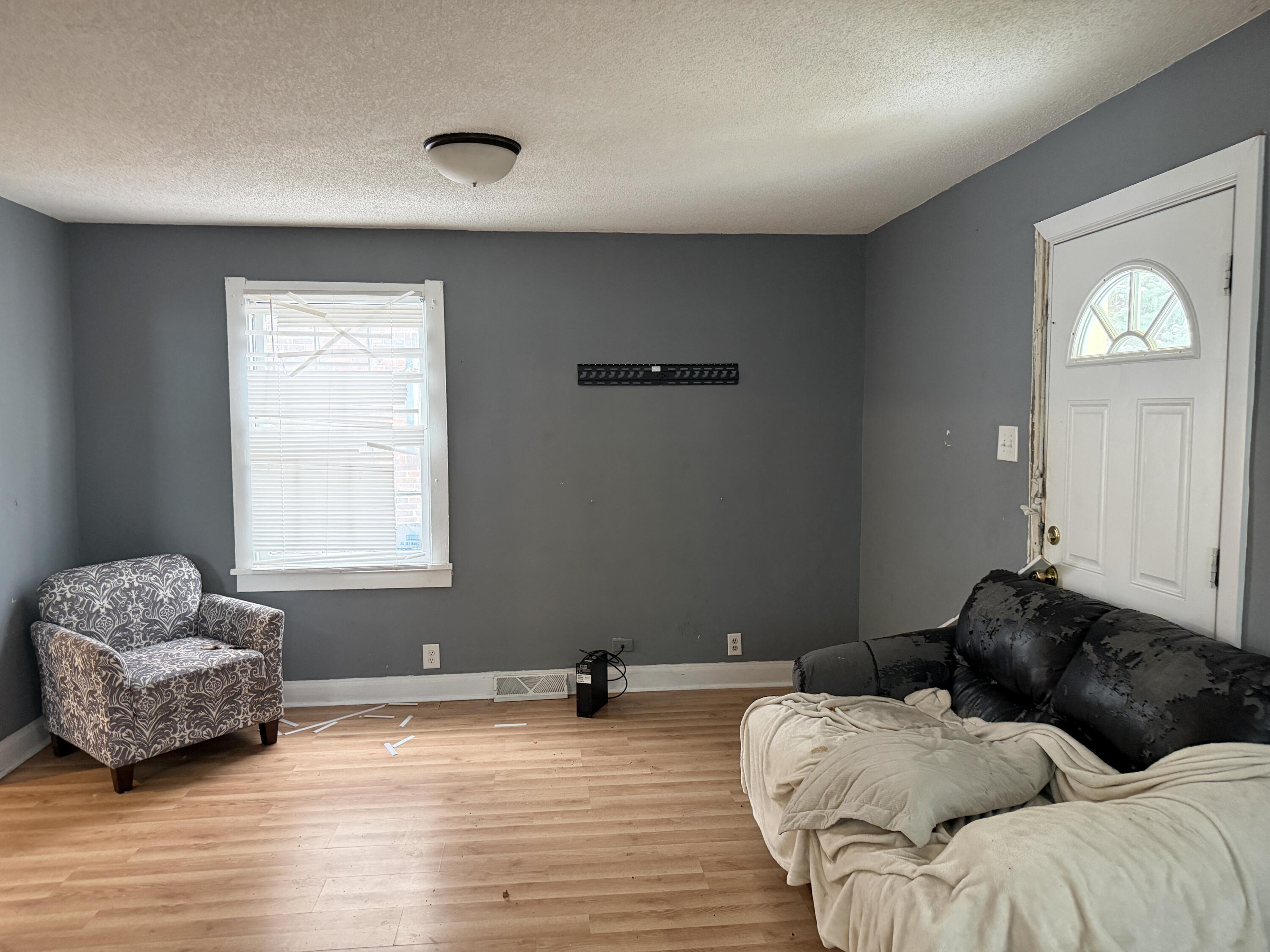 6019 Wallace Road Hammond, IN 46320 - Photo 5 of 10 a living room with furniture and a window