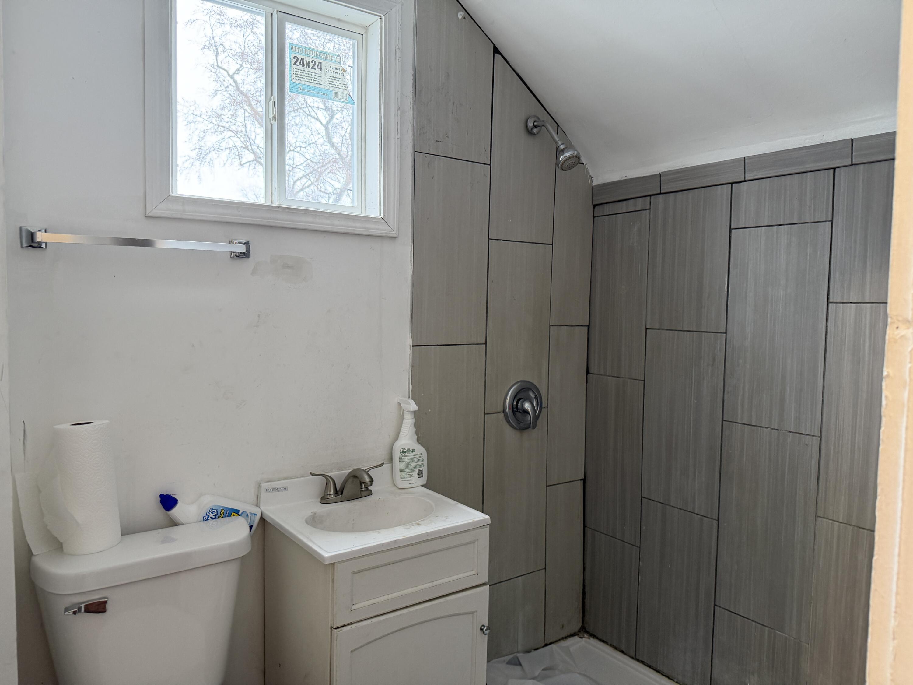 6019 Wallace Road Hammond, IN 46320 - Photo 8 of 10 a bathroom with a sink toilet and shower