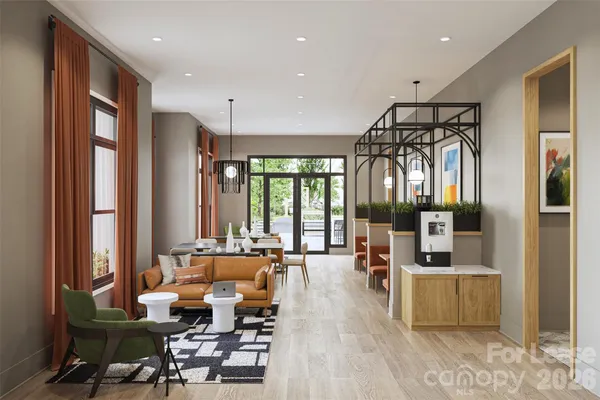 a very nice looking living room with furniture and a large window