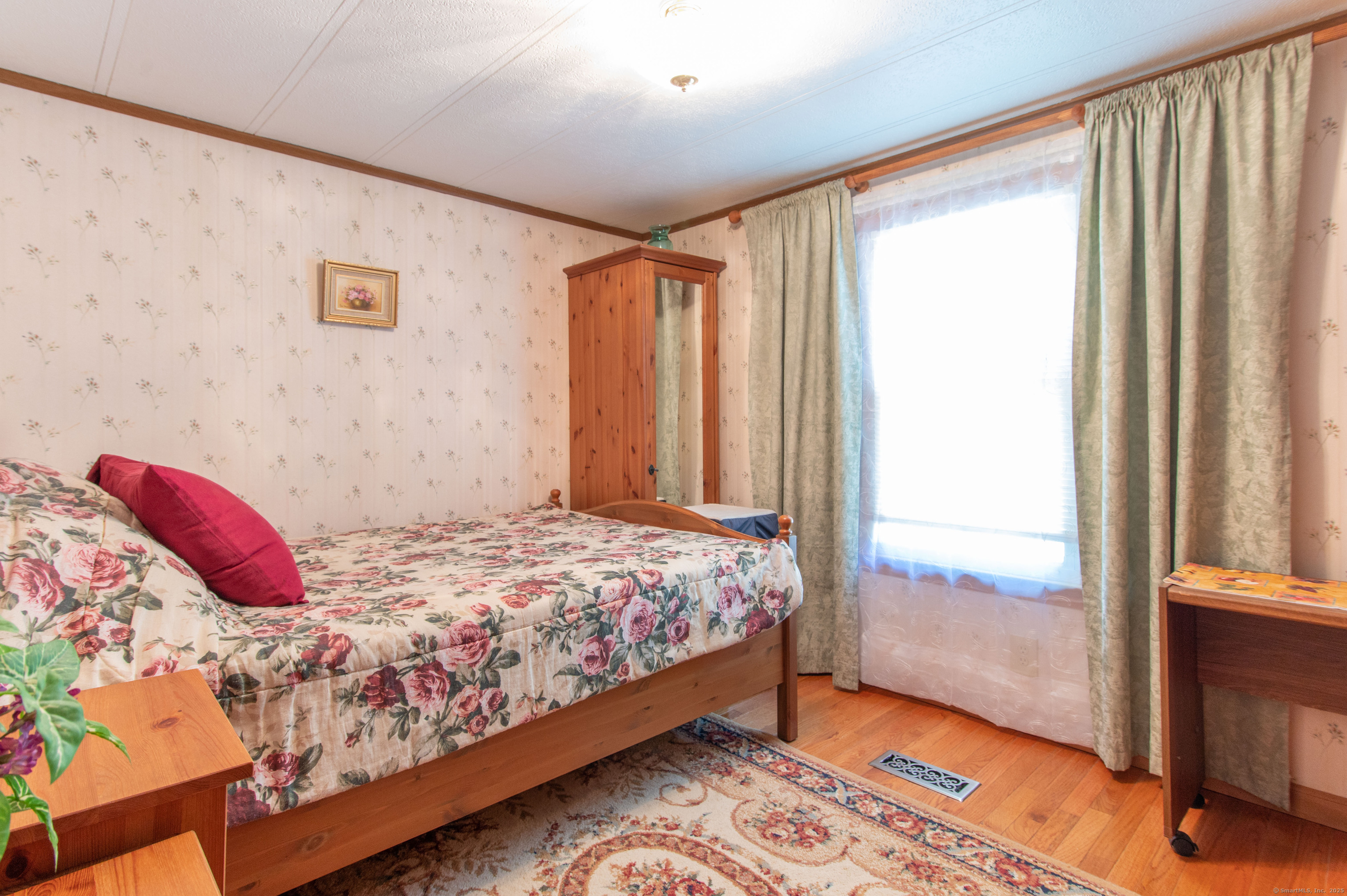 26 Crescent Park Road Westport, CT 06880 - Photo 14 of 23 a bedroom with a bed and a window