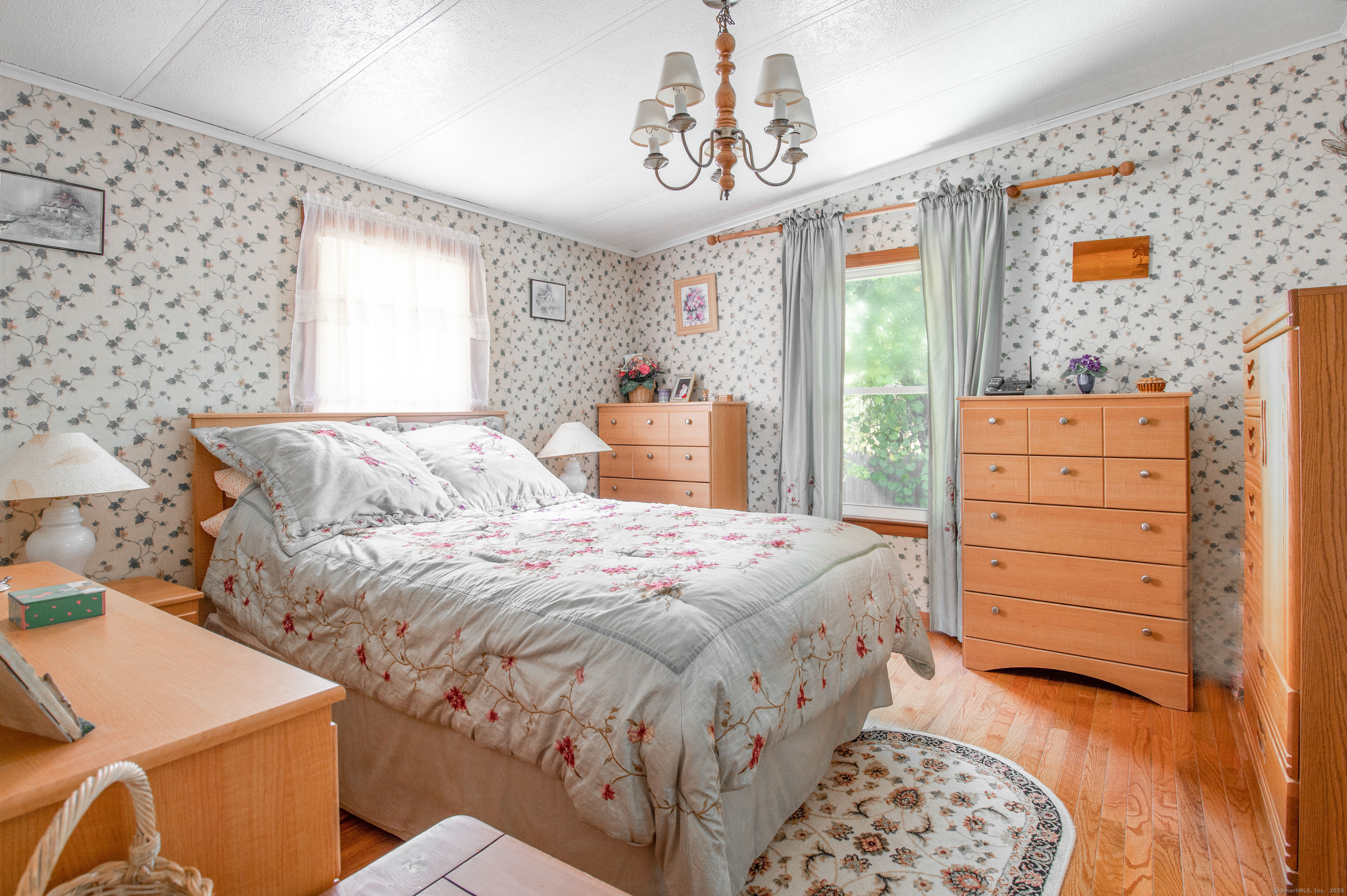 26 Crescent Park Road Westport, CT 06880 - Photo 15 of 23 a bedroom with a bed and a dresser