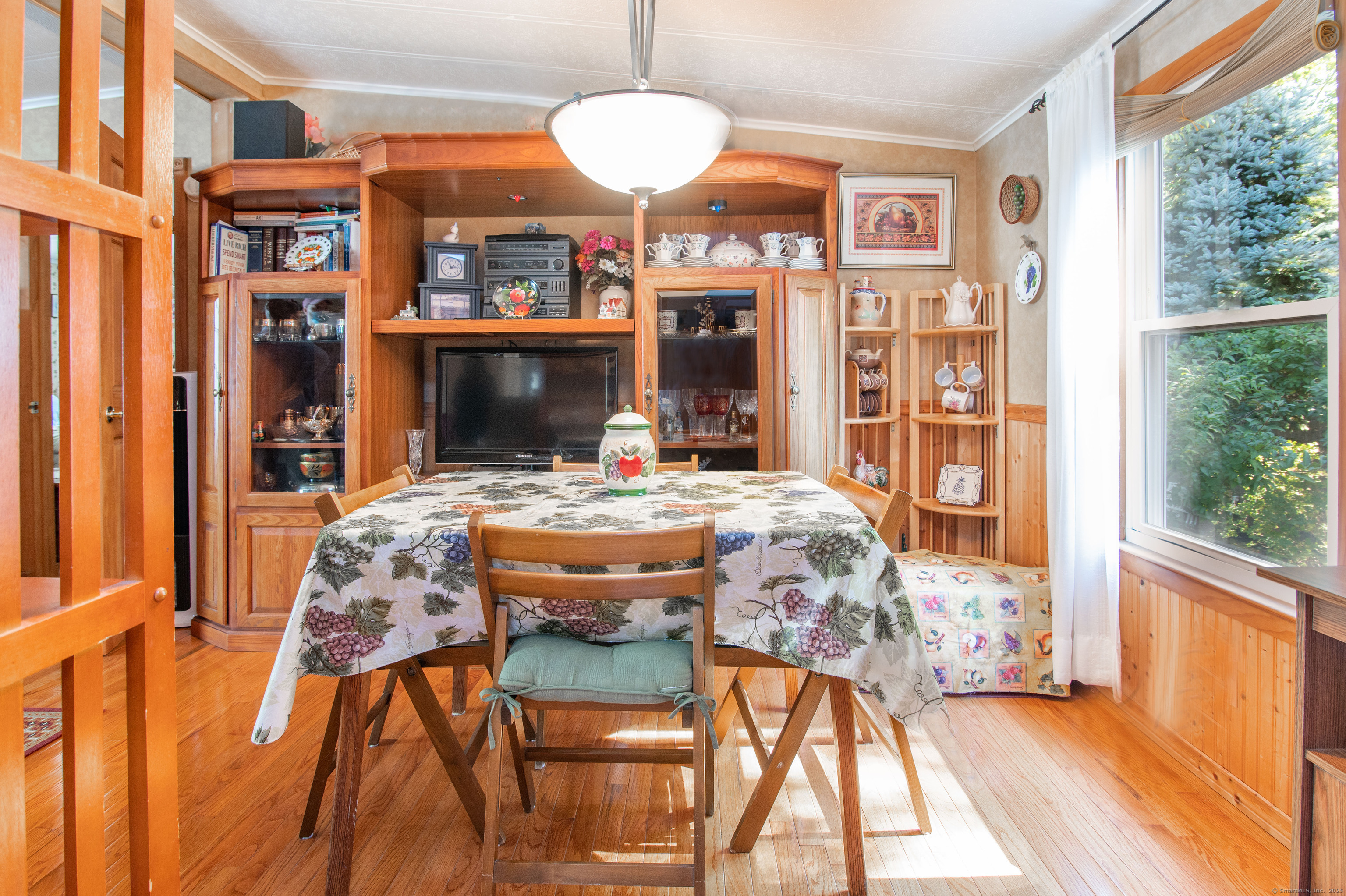 26 Crescent Park Road Westport, CT 06880 - Photo 6 of 23 a view of a dining room with furniture window and wooden floor