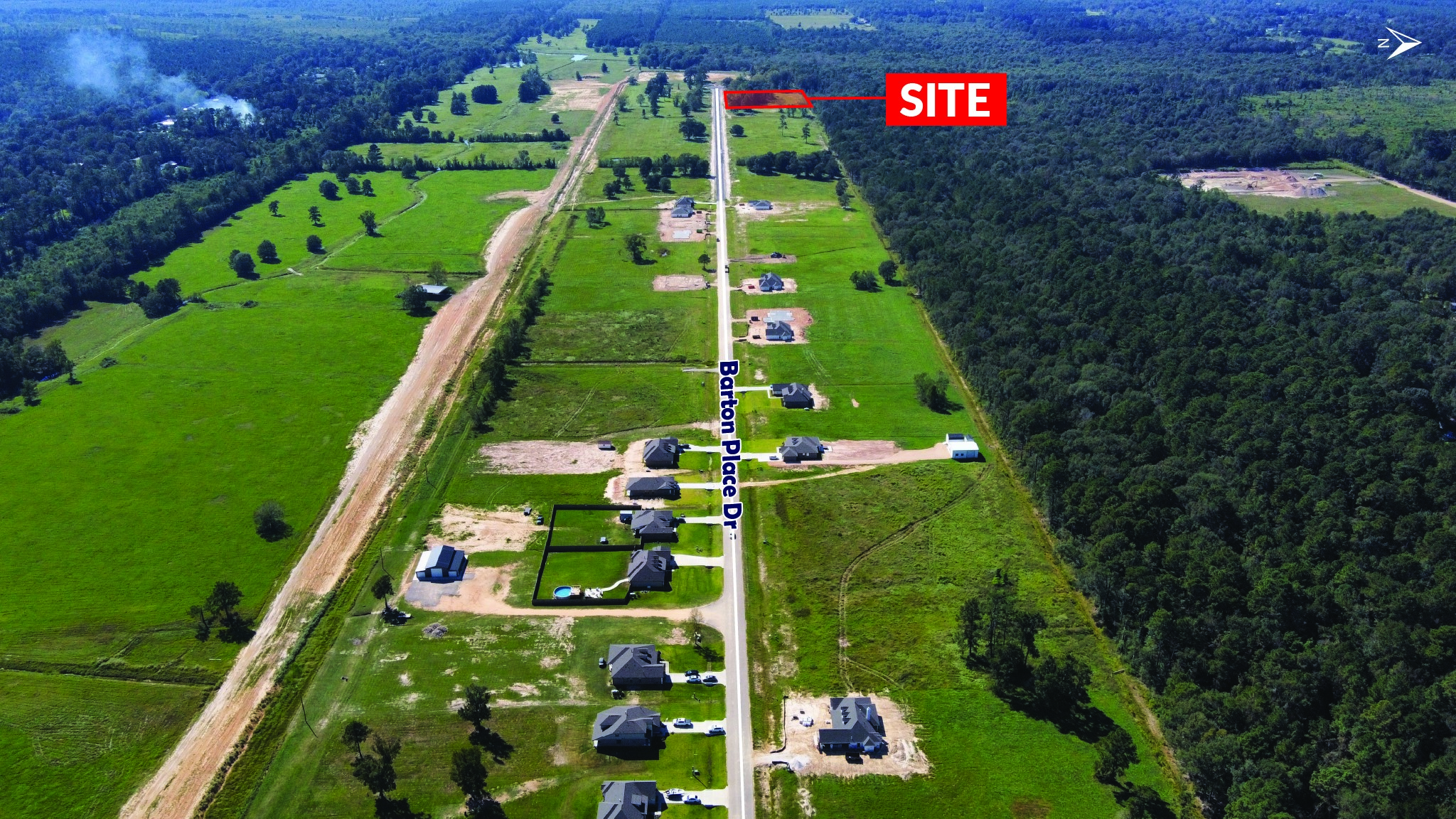 1040 County Road 3081 Cleveland, TX 77328 - Photo 2 of 3 a view of a wooden bridge