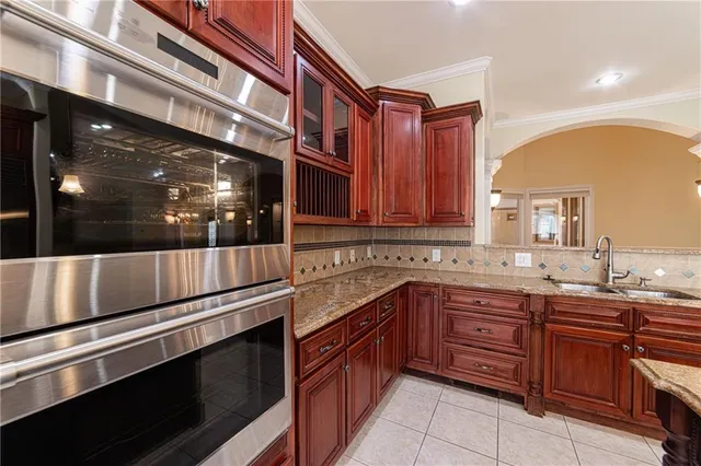 a view of a livingroom with a ceiling fan and window