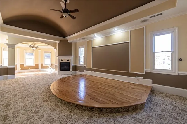 a kitchen with stainless steel appliances granite countertop a sink and wooden cabinets