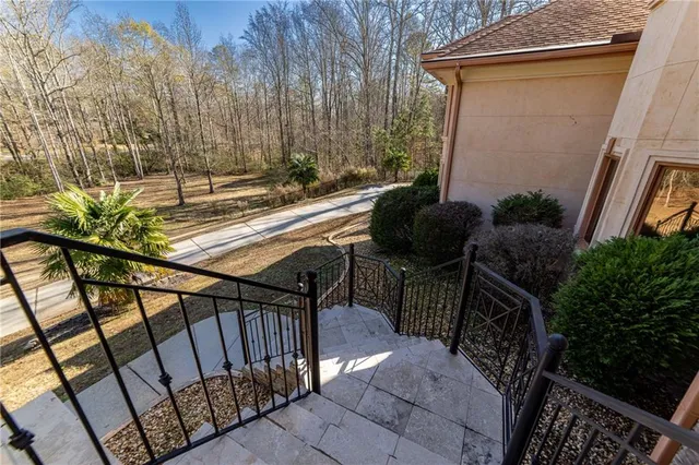 a kitchen with stainless steel appliances granite countertop a sink and cabinets