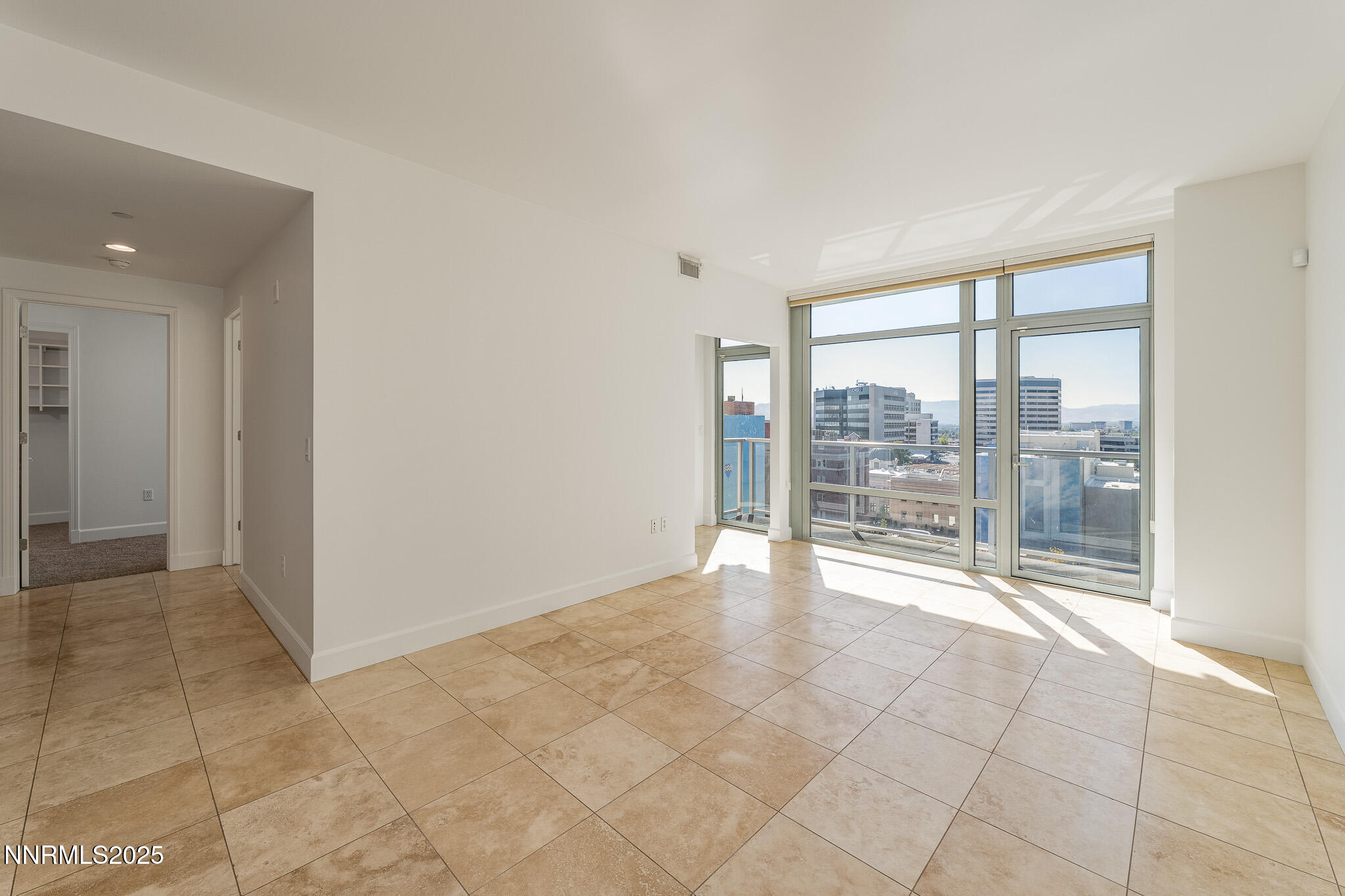 50 North Sierra Street, Unit STE 909 Reno, NV 89501 - Photo 7 of 34 a view of an empty room with a window