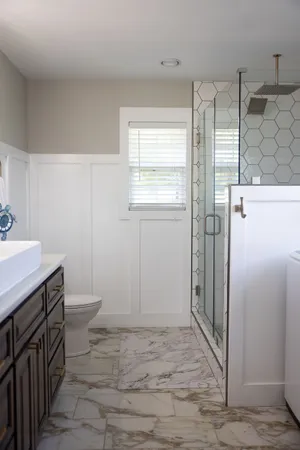 a dirty white wall and a white wall