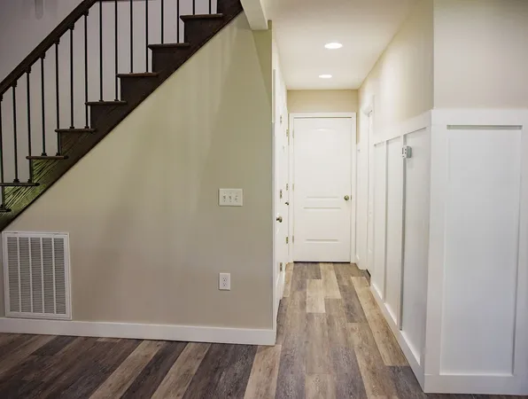 a bedroom with bed and window