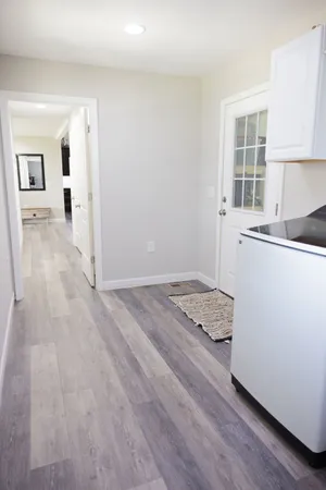 a view of entryway with wooden floor