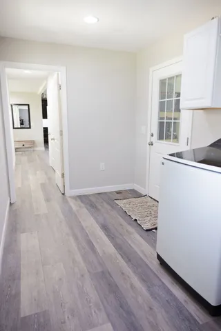 a view of entryway with wooden floor