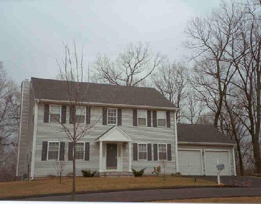 81 Old Colony Road, Unit 81 Monroe, CT 06468 - Photo 1 of 1 a front view of a house with a yard