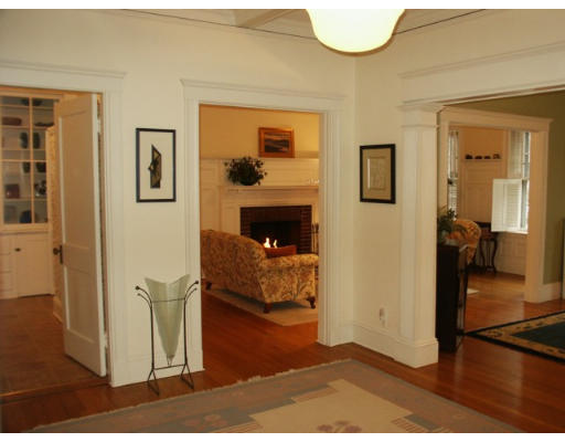 44 Kilsyth Road, Unit 1 Brookline, MA 02445 - Photo 1 of 1 a living room with furniture and a fireplace