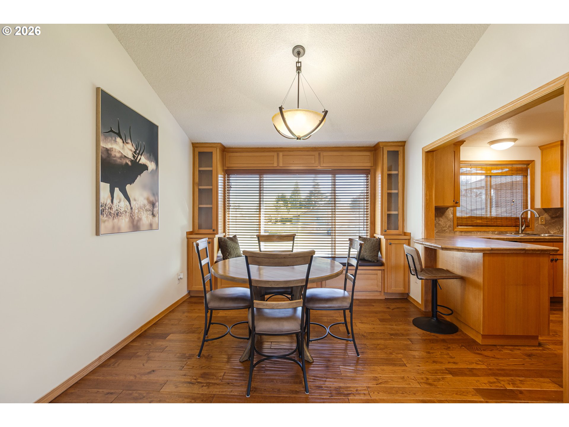 913 South Fir Court Canby, OR 97013 - Photo 7 of 37 a view of a dining room with furniture window and outside view