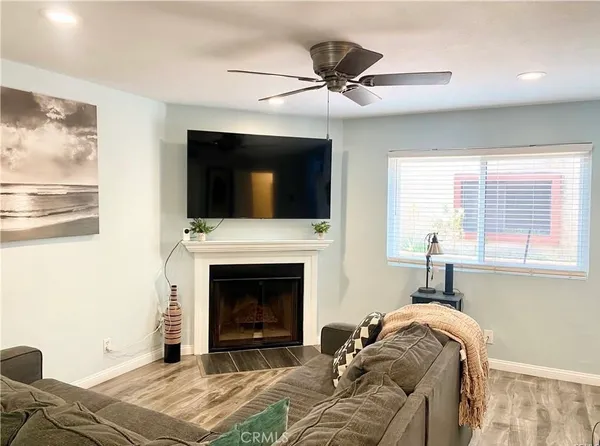 a bedroom with a bed and a fireplace