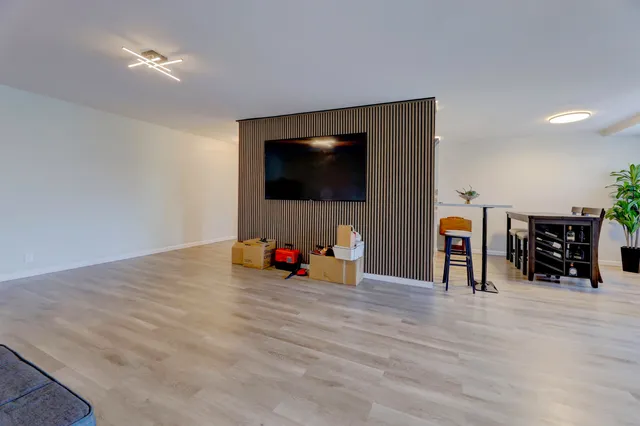 a view of a room with gaming equipment
