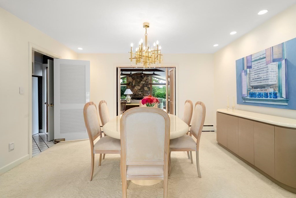 30 Burdean Road Newton, MA 02459 - Photo 11 of 29 a view of a dining room with furniture window and wooden floor