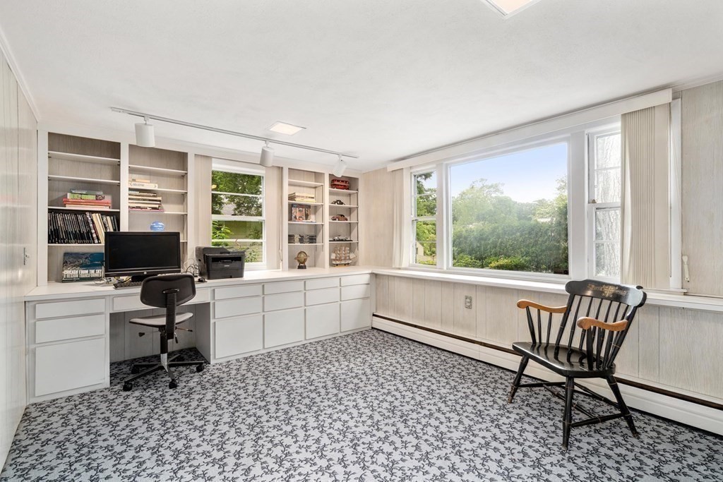 30 Burdean Road Newton, MA 02459 - Photo 21 of 29 a view of a workspace with furniture and a window