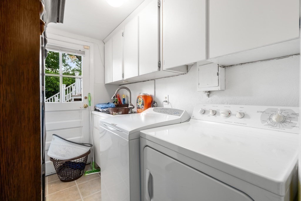 30 Burdean Road Newton, MA 02459 - Photo 23 of 29 a utility room with sink dryer and washer