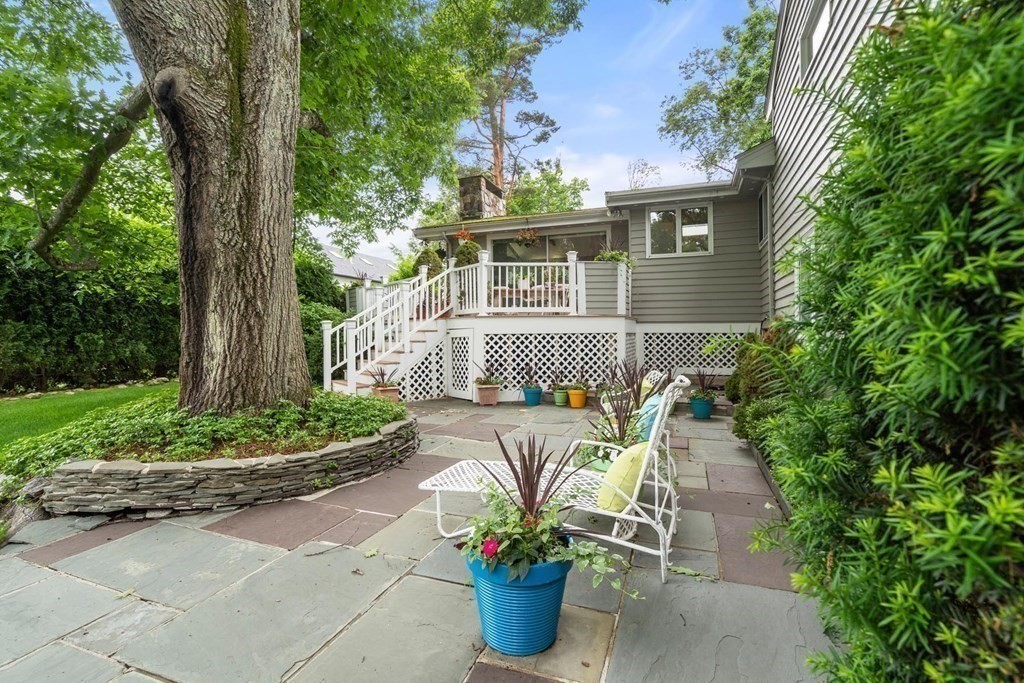 30 Burdean Road Newton, MA 02459 - Photo 25 of 29 a front view of a house with patio