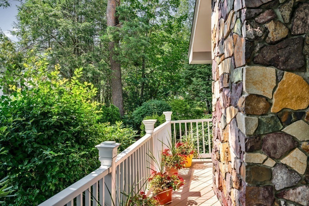 30 Burdean Road Newton, MA 02459 - Photo 26 of 29 a balcony with trees in front of it