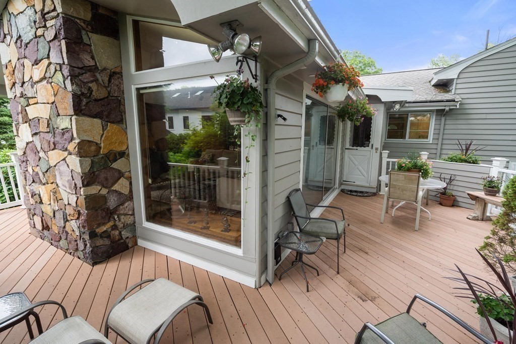 30 Burdean Road Newton, MA 02459 - Photo 29 of 29 a view of a patio with a table and chairs