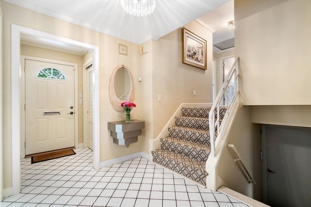 30 Burdean Road Newton, MA 02459 - Photo 4 of 29 a view of entryway with furniture and wooden floor
