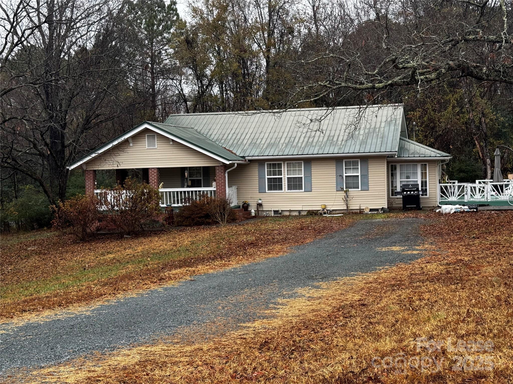 404 Moss Springs Road Albemarle, NC 28001 - Photo 1 of 33 a front view of a house with a yard