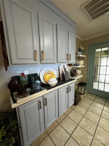a kitchen with a stove a refrigerator and a stove