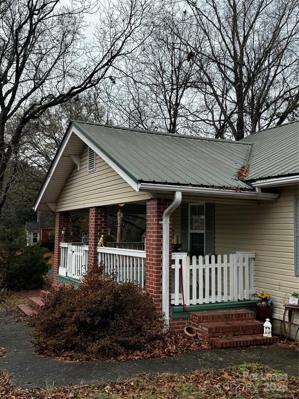 404 Moss Springs Road Albemarle, NC 28001 - Photo 2 of 33 a front view of a house with a yard
