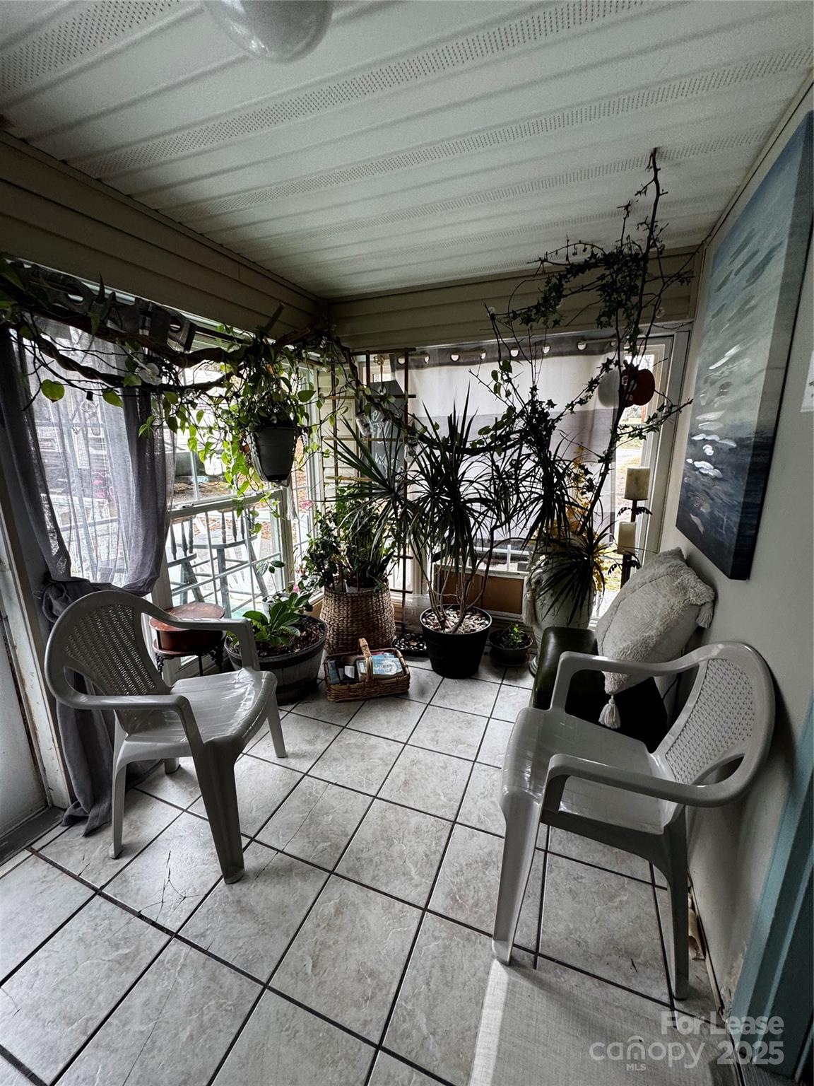 404 Moss Springs Road Albemarle, NC 28001 - Photo 23 of 33 a view of a chairs and table in a patio