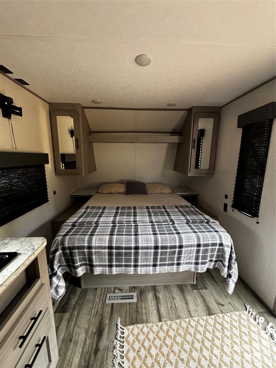 404 Moss Springs Road Albemarle, NC 28001 - Photo 27 of 33 a bedroom with a bed and wooden floor