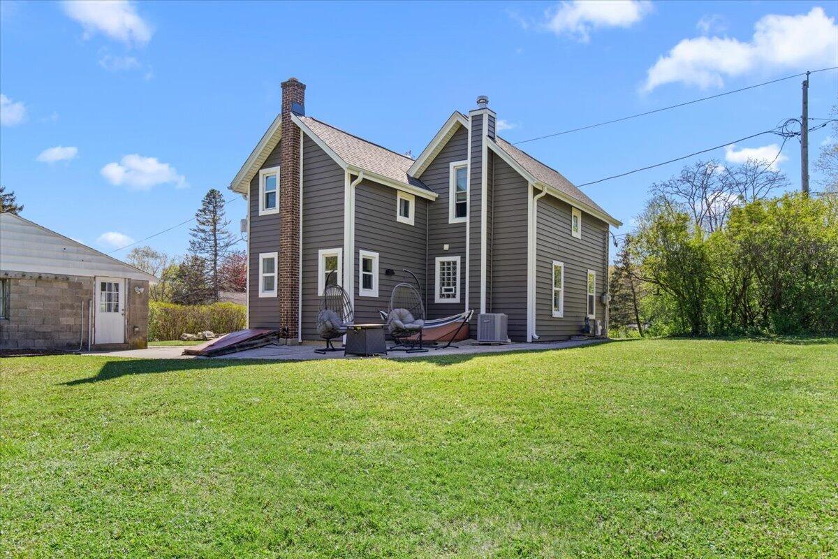 W301N9546 O Neil Road Merton, WI 53029 - Photo 29 of 34 Back of House w/Patio