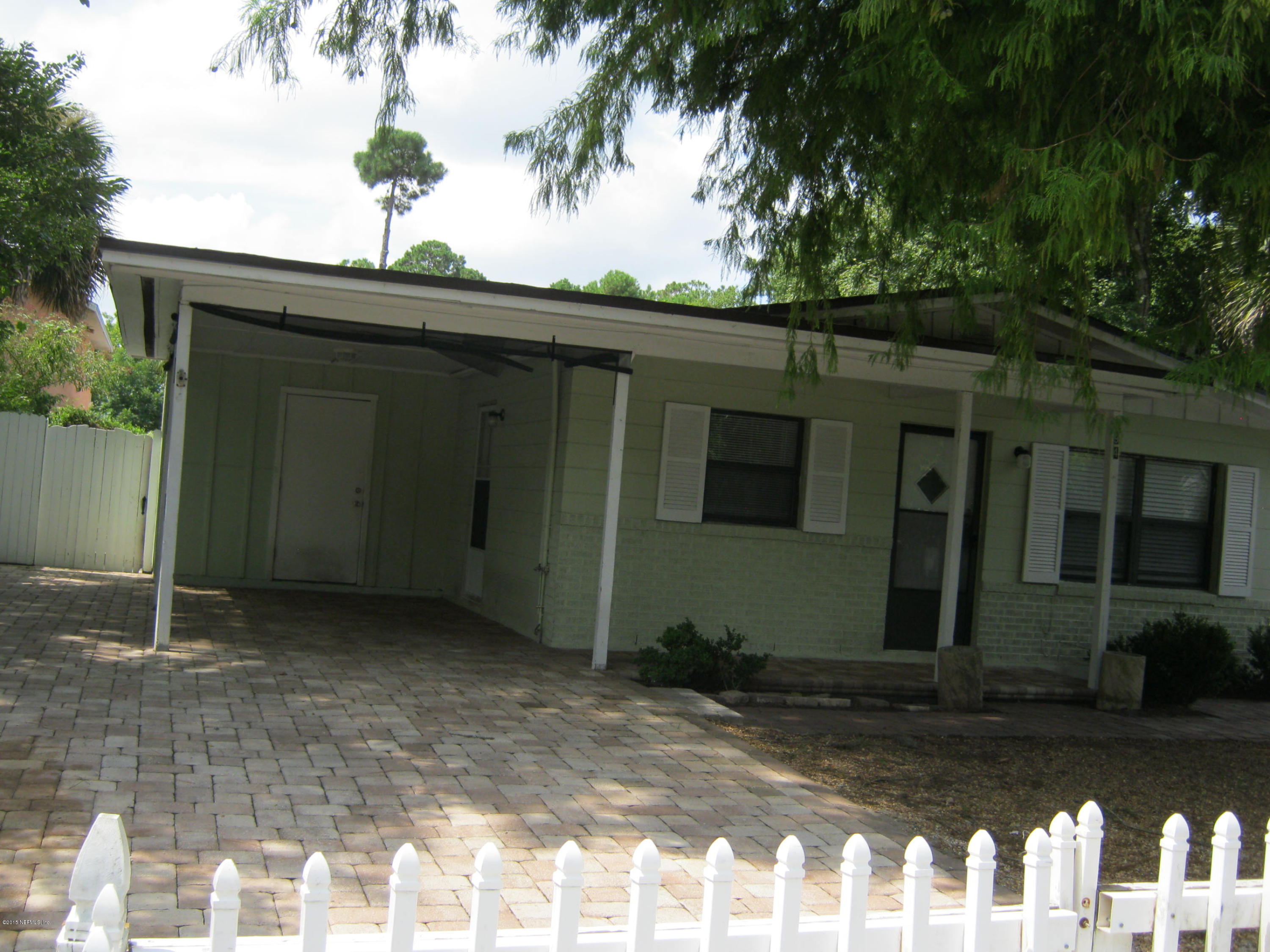 94 Dutton Island Road West Atlantic Beach, FL 32233 - Photo 4 of 16 Carport, driveway is pavers!